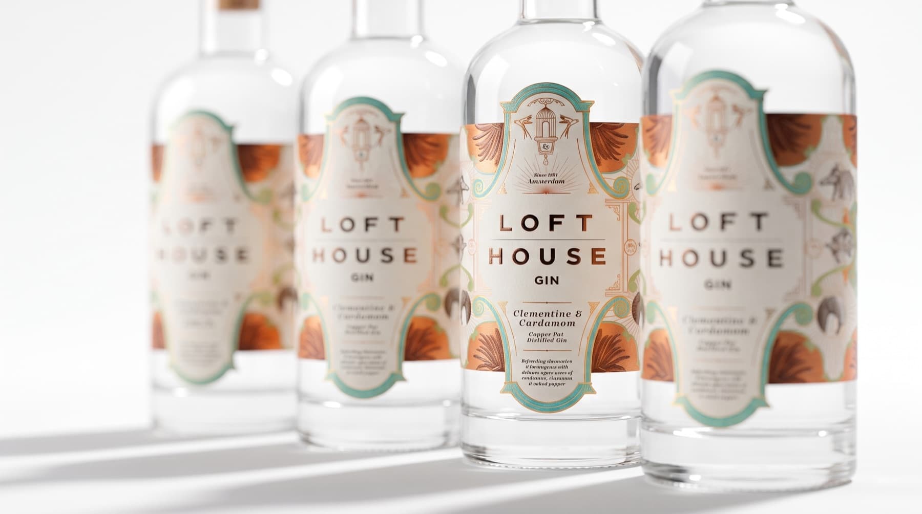 Loft House clementine and cardamom gin bottles in a row